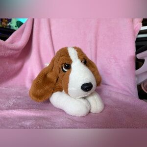 Aurora laying down beagle puppy plush